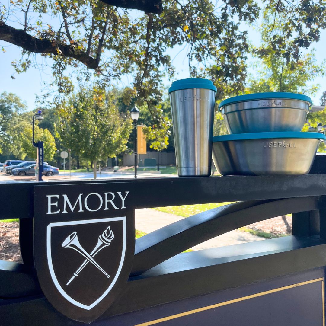USEFULL reusable takeout containers positioned nearby Emory University signage